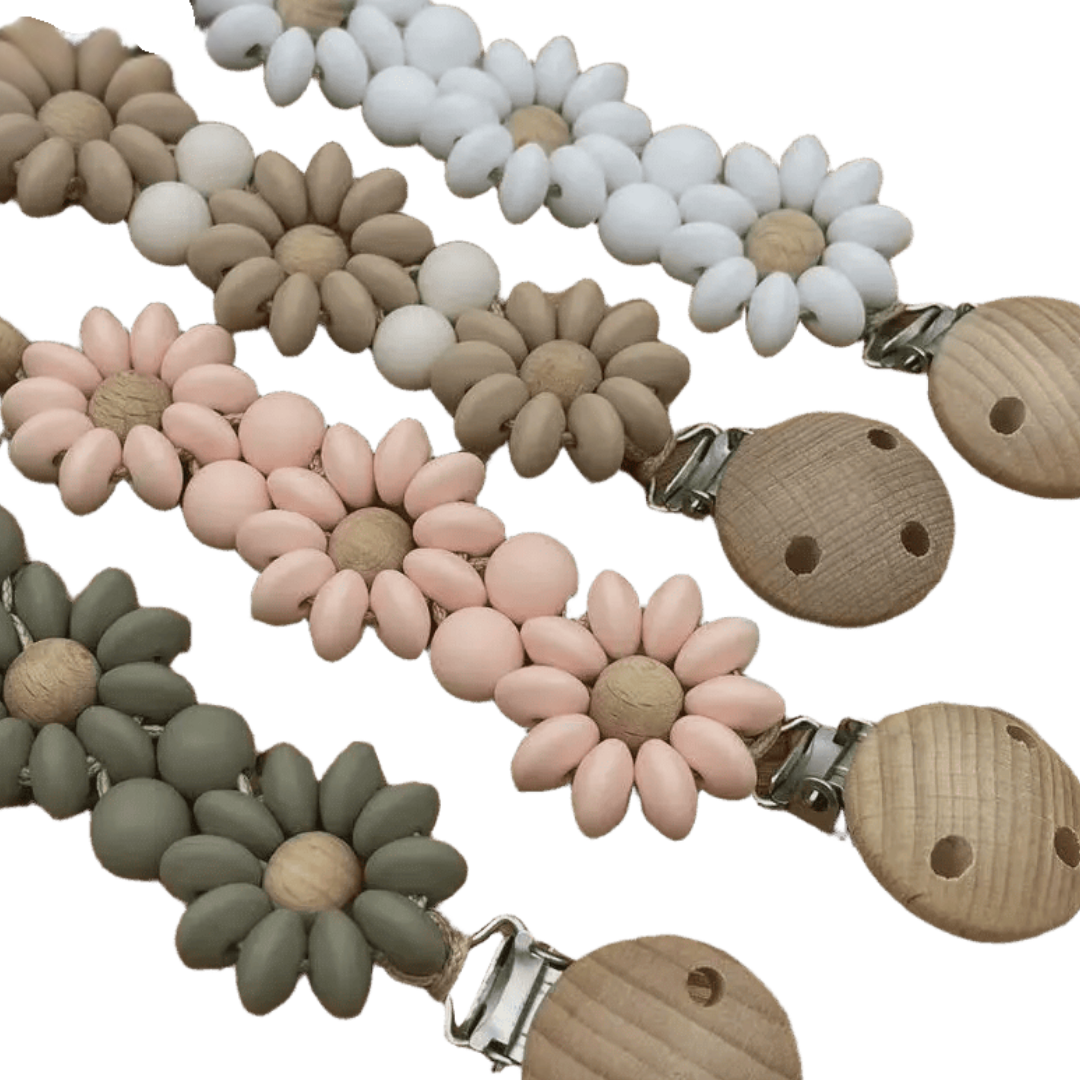 Vier speenkoorden met een bloemdesign, hout en silicone materialen